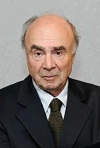 Адам Холендер